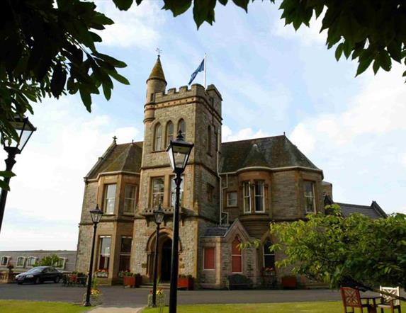 Photo of front entrance to the Culloden Hotel in Cultra where Vespers is located