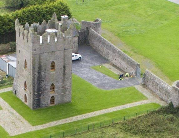 Photo of birds eye view of Kirkistown Castle surrounded by grassland