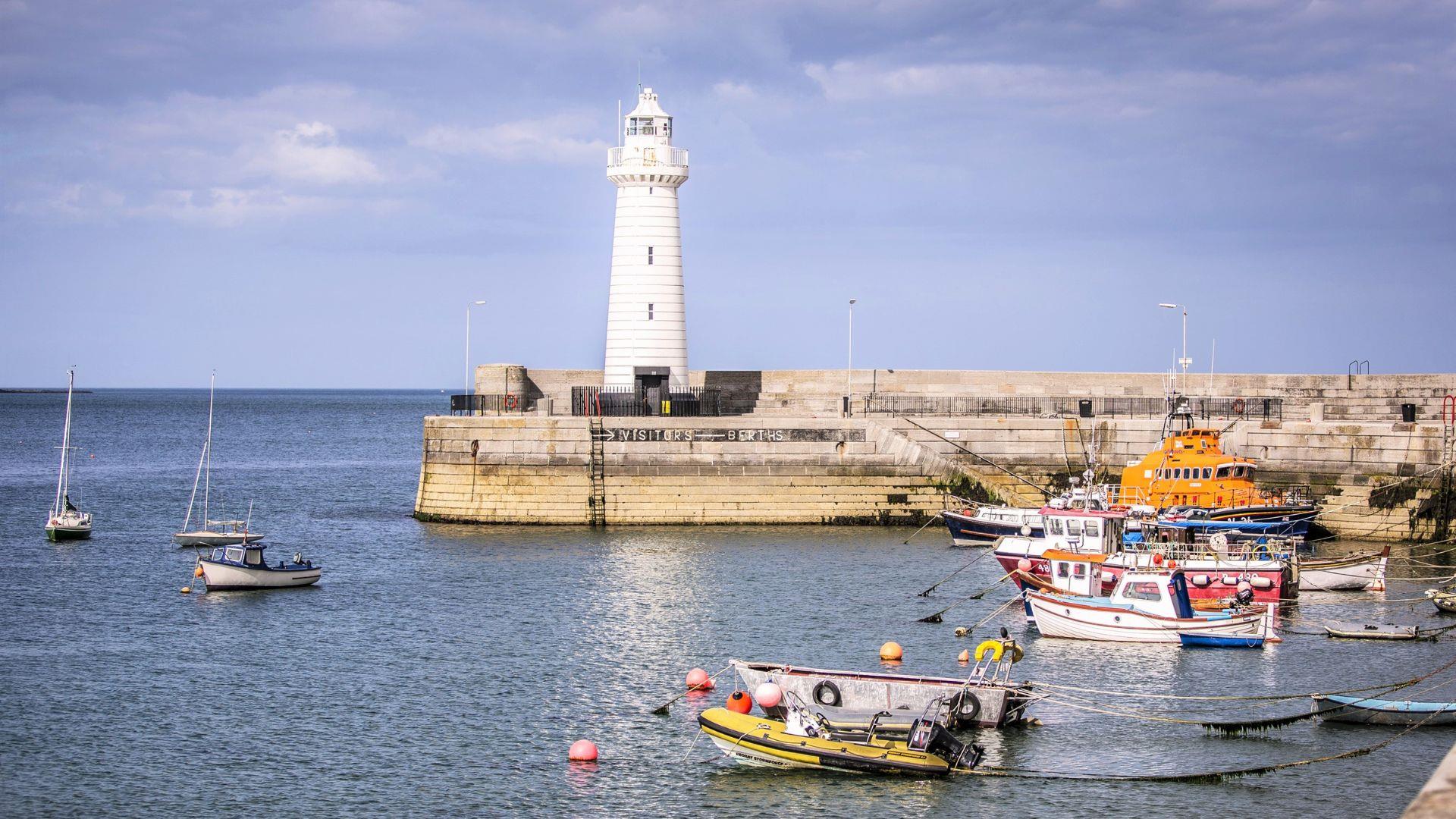 Donaghadee Lighthouse, harbour and boats.