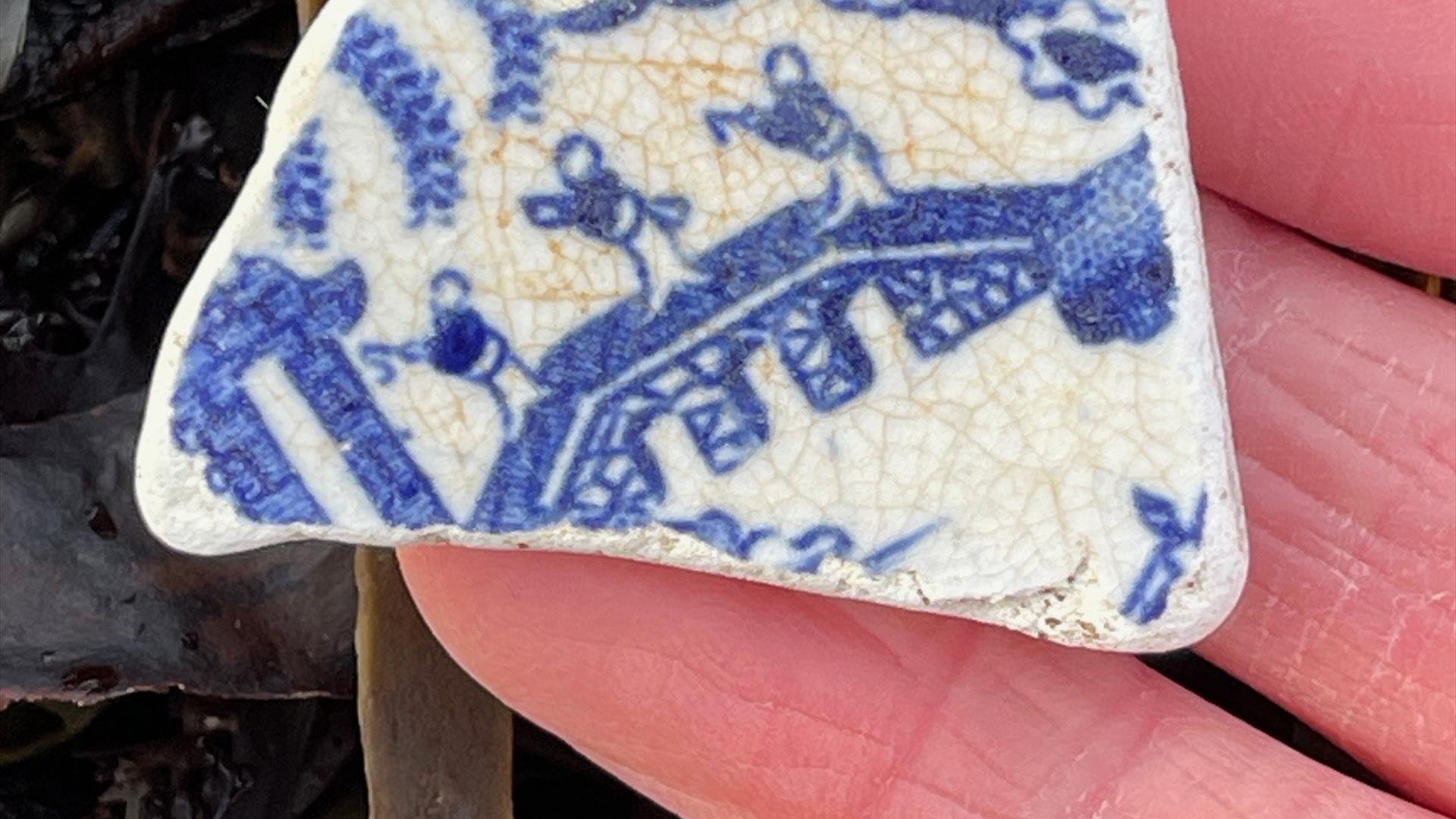 Blue and white pottery from beach