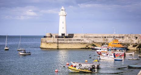 Donaghadee Lighthouse, harbour and boats.