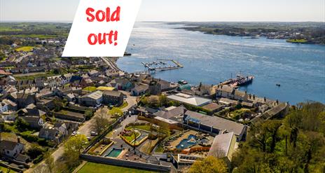 An aerial photo of portaferry with sold out note