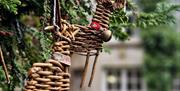 CHRISTMAS WILLOW REINDEER MOBILE HANGING FROM A TREE