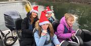 Boat Trip with Santa Hats