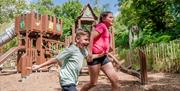 image of 2 children enjoying the play area