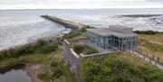 Aerial view of the Limekiln Observatory - a glass building overlooking Strangford Lough