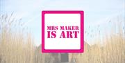 Mrs Maker is Art logo with WWT Castle Espie thatched hut and wild grass in the background